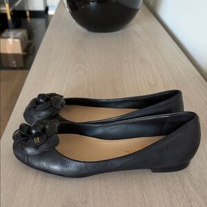 CHANEL Black CAMELLIA Flats with Floral Detail